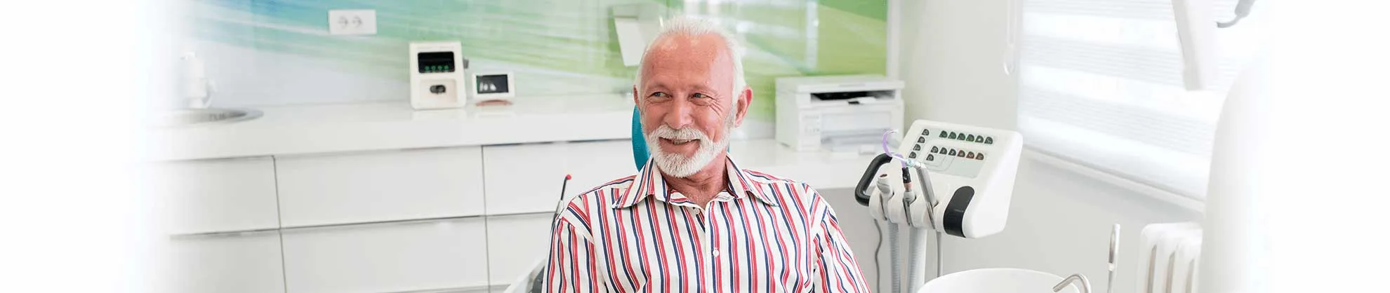 Senior patient smiling in the dental chair